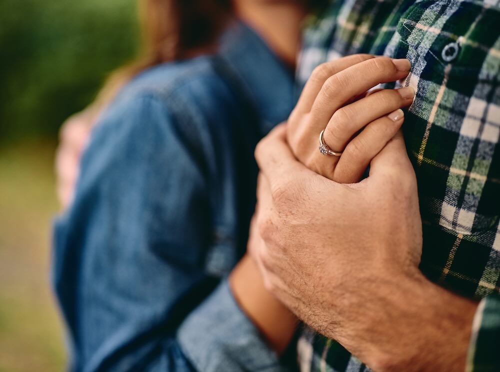 Husband and wife hugging, a close up